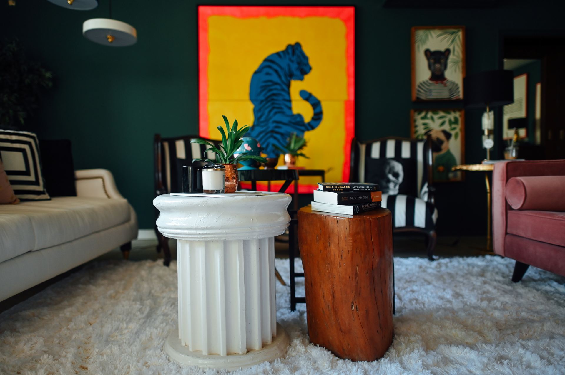 Forest-green living room with a blue tiger pop-art canvas